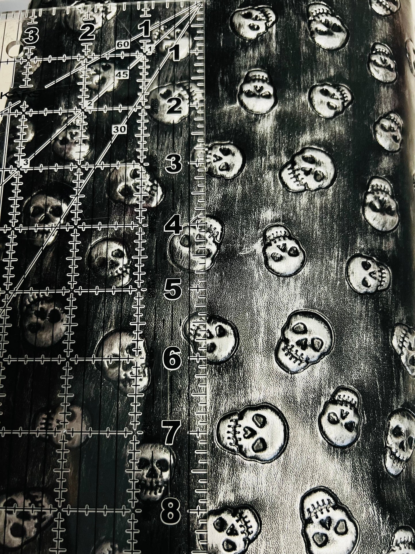 RETAIL Embossed Skulls .8mm Soft Back VINYL
