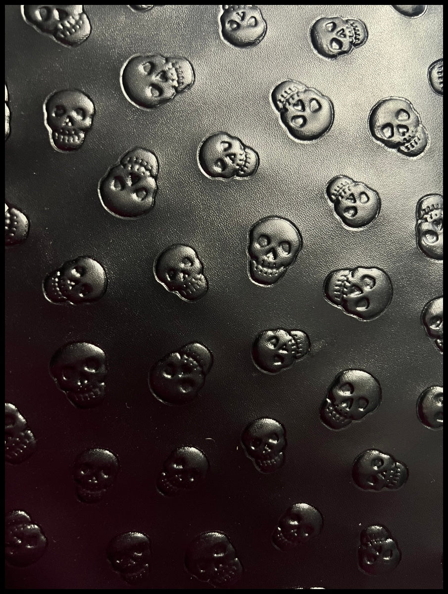 RETAIL Embossed Skulls .8mm Soft Back VINYL
